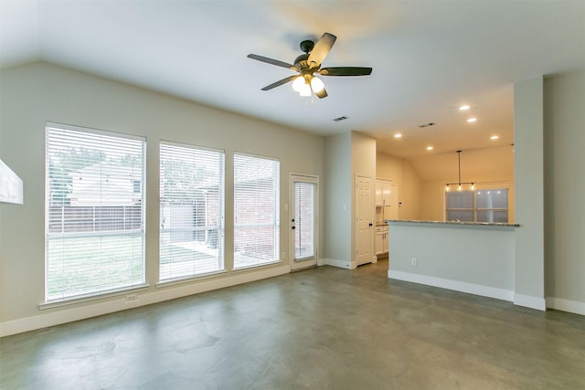 unfurnished living room featuring ceiling fan, concrete flooring, and lofted ceiling