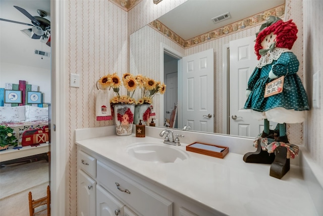 bathroom with vanity and ceiling fan