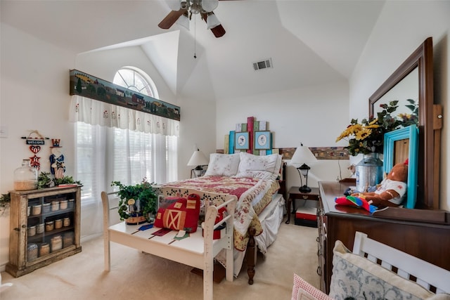 bedroom with ceiling fan, light carpet, and lofted ceiling