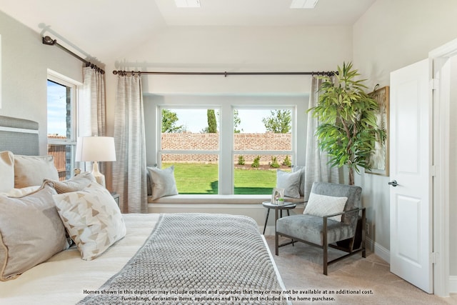 bedroom with light colored carpet and lofted ceiling