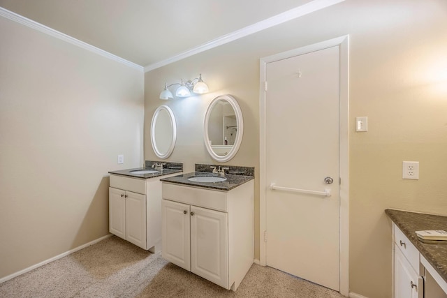 bathroom with vanity and ornamental molding