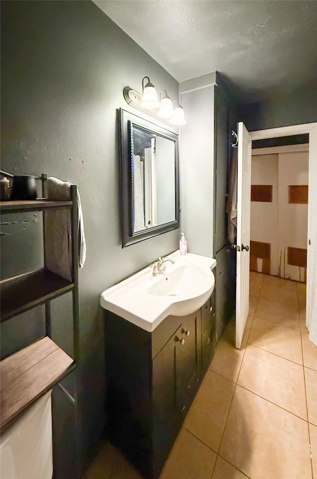 bathroom with vanity and tile patterned floors