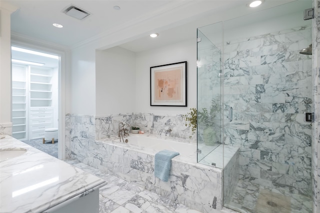 full bathroom featuring ornamental molding, vanity, independent shower and bath, and toilet