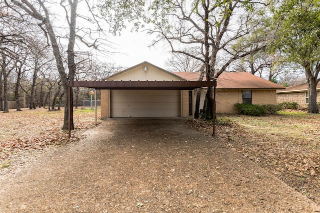 single story home featuring a carport