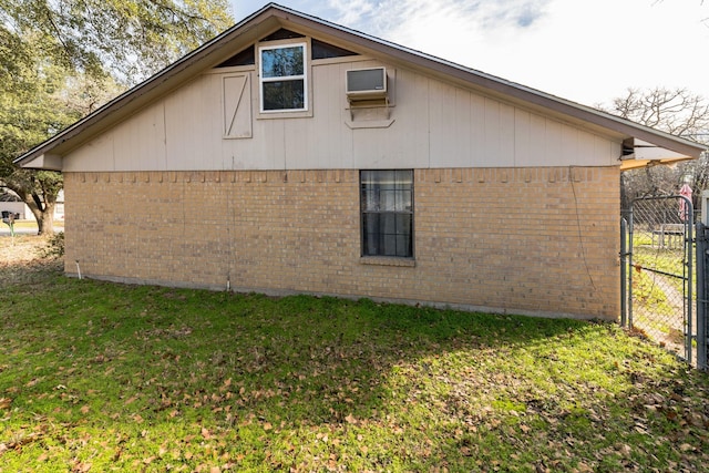 view of home's exterior featuring a yard