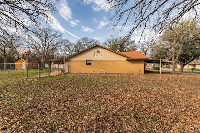 view of property exterior with a carport