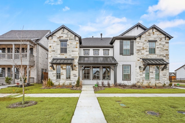 view of front of house with a front lawn