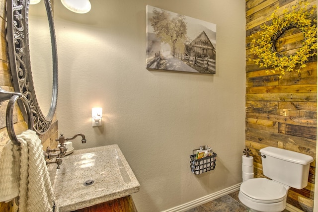 bathroom with vanity, toilet, and tile patterned flooring