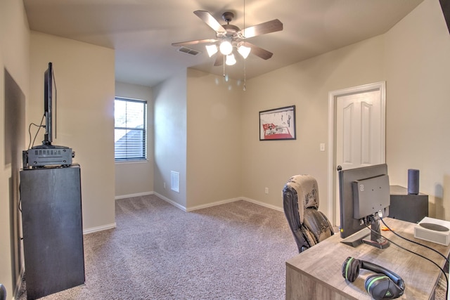 office area with light carpet and ceiling fan