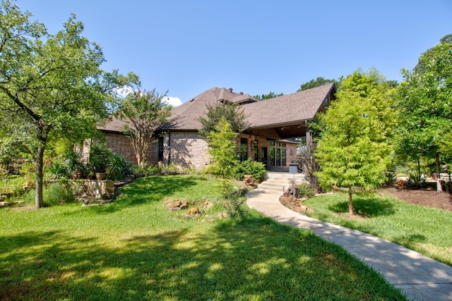 view of front of home with a front yard