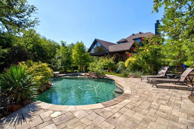 view of patio with an outdoor living space, a gazebo, exterior bar, and ceiling fan