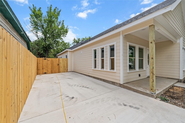 view of property exterior featuring a patio