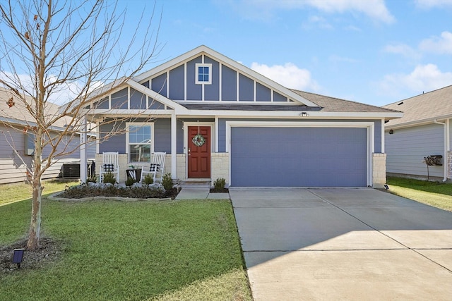 craftsman inspired home with central AC, a garage, covered porch, and a front lawn