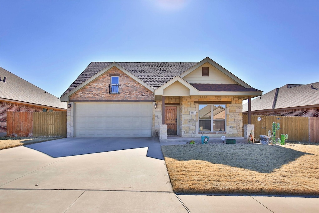 view of front of property featuring a garage