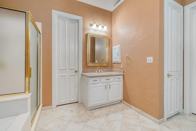 bathroom with vanity, tile patterned floors, and a shower with shower door