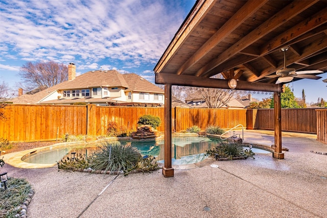 view of patio / terrace featuring ceiling fan, a fenced in pool, and a gazebo