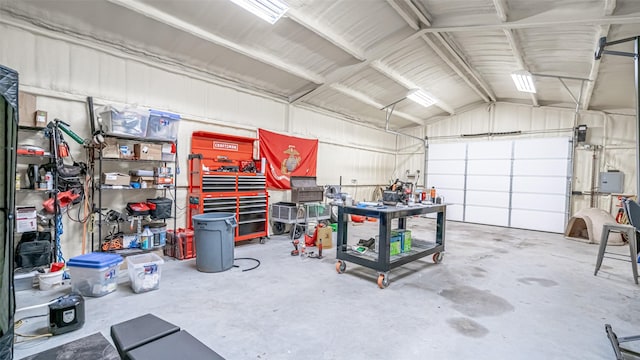 garage with a workshop area