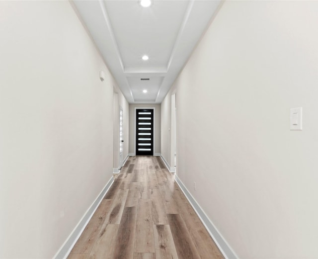 hallway featuring light wood-type flooring