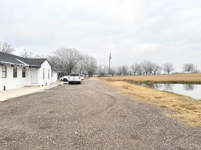 view of street featuring a water view