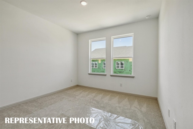 view of carpeted spare room