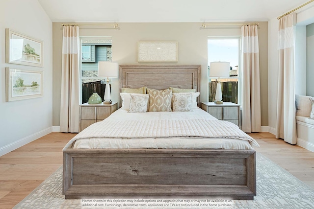 bedroom with light hardwood / wood-style floors