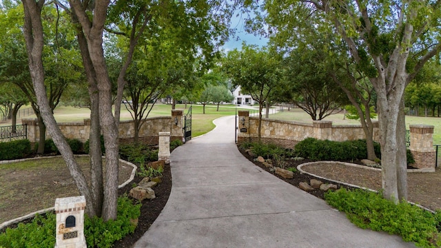 view of community featuring a yard