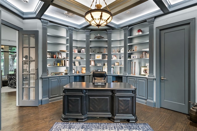 office area with built in shelves, dark hardwood / wood-style floors, and crown molding