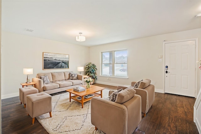 living room featuring dark hardwood / wood-style flooring