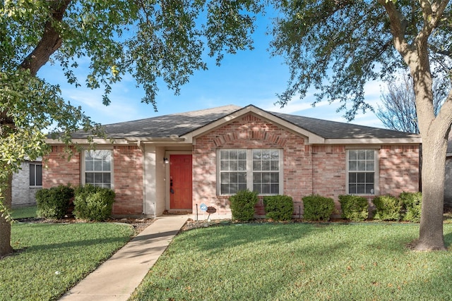 ranch-style house with a front lawn