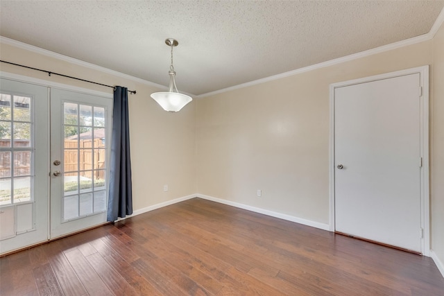 unfurnished room featuring ornamental molding, a textured ceiling, french doors, and dark hardwood / wood-style floors