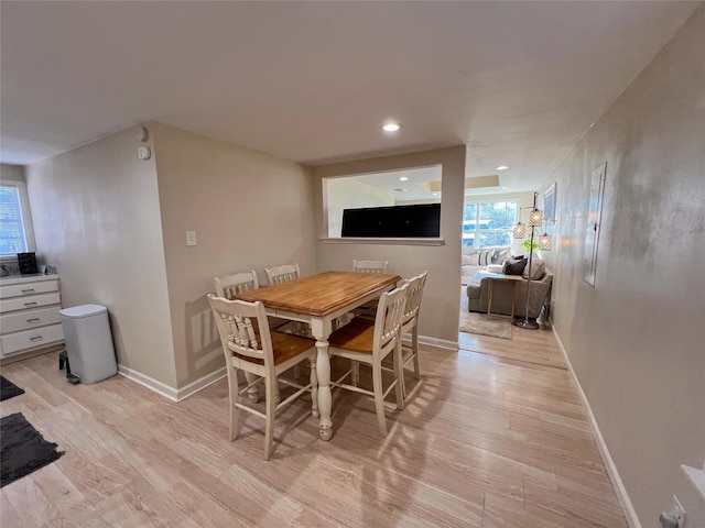 dining room featuring light hardwood / wood-style floors