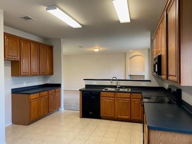 kitchen with sink and black appliances