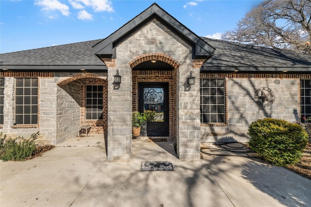 property entrance with a patio area