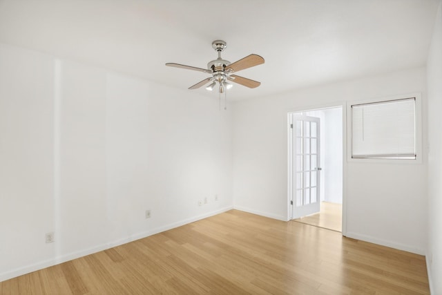 unfurnished room with ceiling fan and light hardwood / wood-style flooring