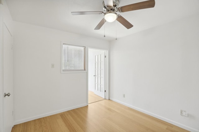 unfurnished room featuring ceiling fan and light hardwood / wood-style floors