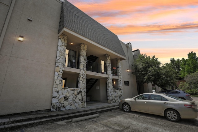 view of property exterior at dusk