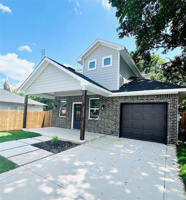 view of front of home with a garage