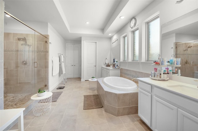 bathroom featuring a garden tub, recessed lighting, a shower stall, vanity, and tile patterned floors