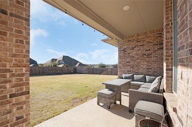 view of patio / terrace featuring an outdoor hangout area and a fenced backyard