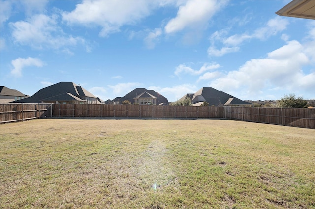 view of yard featuring a fenced backyard