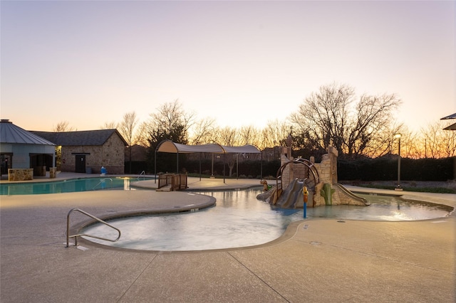 pool featuring a patio