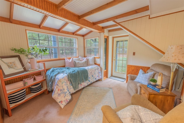 bedroom featuring access to outside, lofted ceiling with beams, light colored carpet, and wood walls