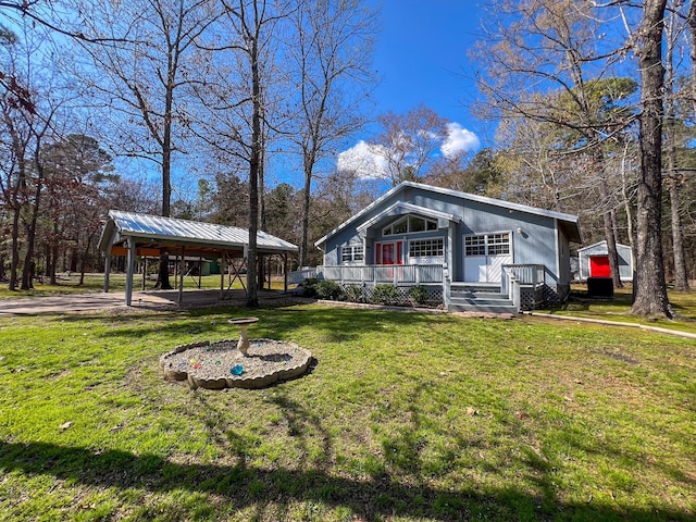 view of property exterior with a gazebo, a yard, and a porch