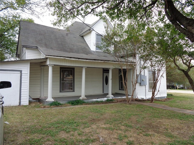 view of front of home with a front lawn and a porch