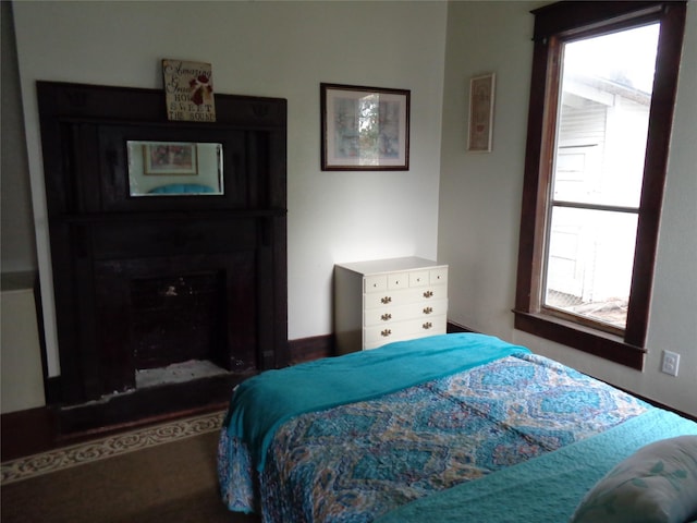 bedroom with multiple windows