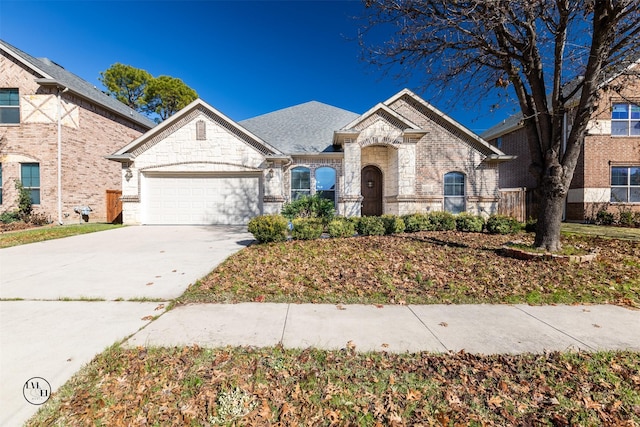 view of front of property featuring a garage