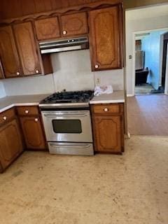 kitchen with gas stove and range hood