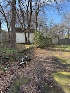 view of yard with a storage shed