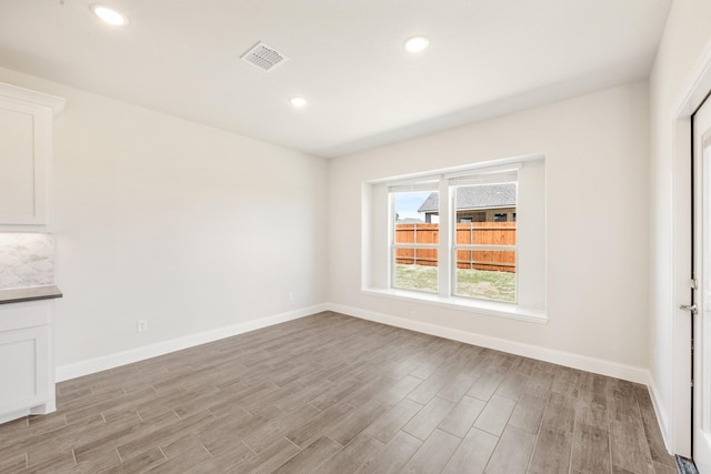 329 Sparkling Springs Dr, Waxahachie, TX 75165 - empty room featuring light wood-type flooring, baseboards, and recessed lighting