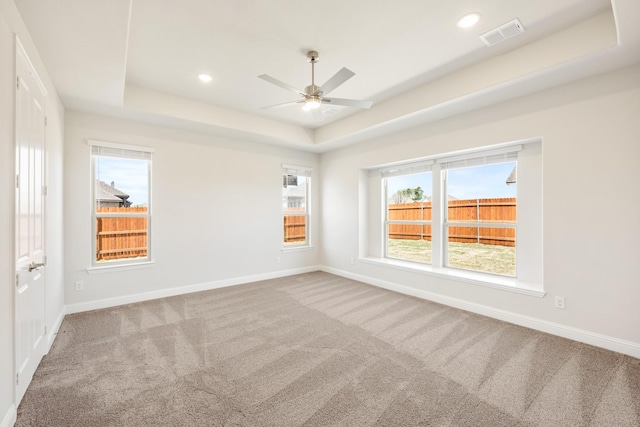 329 Sparkling Springs Dr, Waxahachie, TX 75165 - carpeted spare room featuring a raised ceiling, ceiling fan, baseboards, and recessed lighting